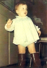 [ Sue with Grandpa's boots ]